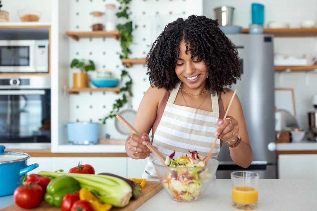 Advanced Body Foods Woman Enjoying An Alkaline Meal For Optimized Health 